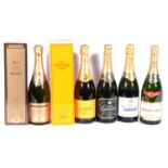 Five bottles of assorted NV Champagne