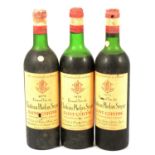 1976 Ch Phelan Segur, Saint Estephe (x2), and a bottle of 1975 vintage