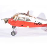 Piper Pacer flying aircraft model, red body 'G-BRSA' with OS FS-120 engine.