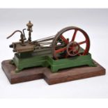 A well-made horizonal steam mill engine, on wooden base, length 20cm.