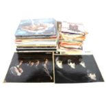 LP and 7" vinyl music records, including The Rolling Stones and The Beatles.