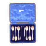 A cased set of six silver teaspoons and sugar tongs.