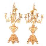 Pair of modern lacquered brass five-light candelabra