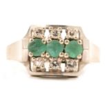 A contemporary emerald and diamond ring,