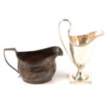 Two George III silver cream jugs, maker's marks rubbed, London 1798 and 1811
