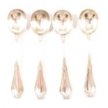 Tiffany & Co. - a set of four silver-plated soup/serving spoons.