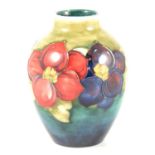 Moorcroft Pottery - a Clematis pattern vase.