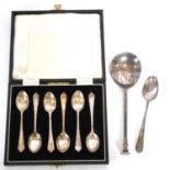 A cased set of silver coffee spoons, a seal top spoon and teaspoon.
