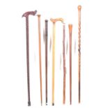 Collection of seven walking sticks