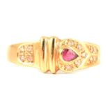 A ruby and diamond dress ring.