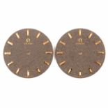 Two Omega watch dials,