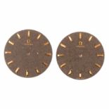 Two Omega watch dials,