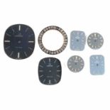 Six Omega watch dials and a calendar ring,
