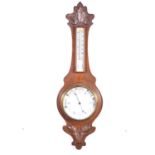 Victorian oak cased aneroid barometer and thermometer,