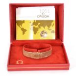 Omega - a lady's 9 carat yellow gold bracelet watch.