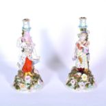 Pair of large Continental porcelain figural candlesticks