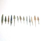 A collection of Bronze Age Luristan arrowheads, all as found.