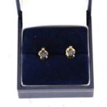 A pair of sapphire and diamond earrings.