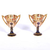 Pair of Royal Crown Derby twin-handled goblets, Imari pattern