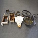Three cast iron hoppers, a vintage tiller with wheel, shoe lasts, pan etc.