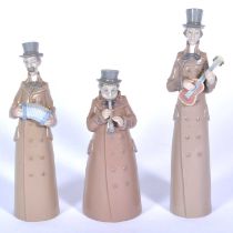 Three Lladro street musicians