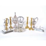 A quantity of silver-plated wares, and four brass candlesticks.