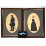 Pair of Victorian silhouettes and a small butterfly wing picture