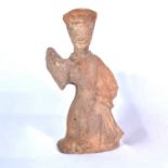 Han dynasty pottery figure of a standing court attendant,