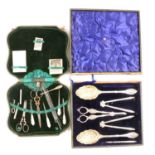 Silver-plated fruit and nut serving set, and lady's sewing set.