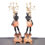 Pair of carved and painted wood blackamoor floor standing candelabra