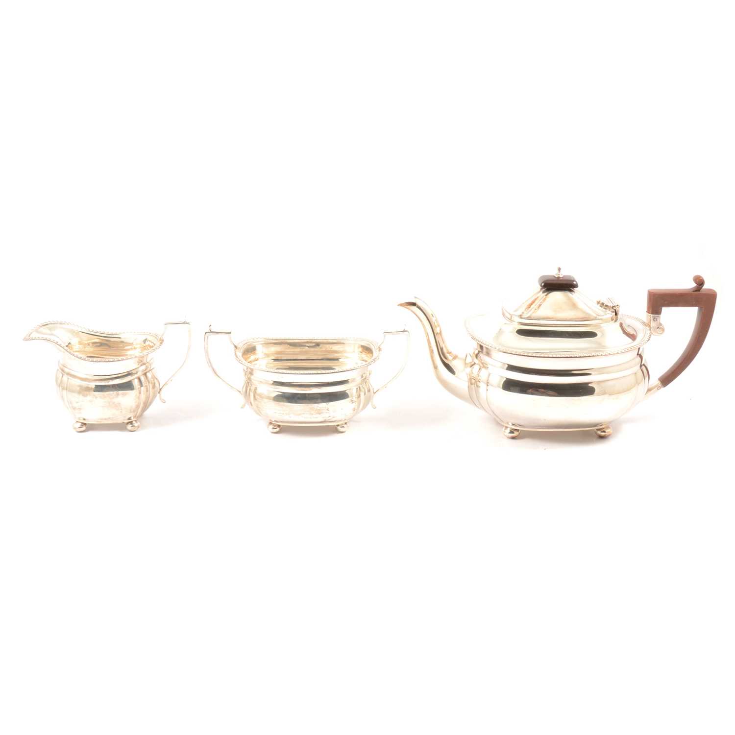 Georgian style three-piece silver teaset, Adie Brothers, Birmingham, 1947-8