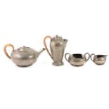 Four-piece Tudric pewter tea service, retailed by Liberty & Co, circa 1900