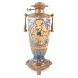 Florence Barlow for Doulton Lambeth, a stoneware oil lamp base with ornate metal mounts