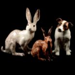Three Winstanley pottery figures - two hares and a Terrier
