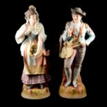 Pair of large continental bisque porcelain figures of Spaniards.
