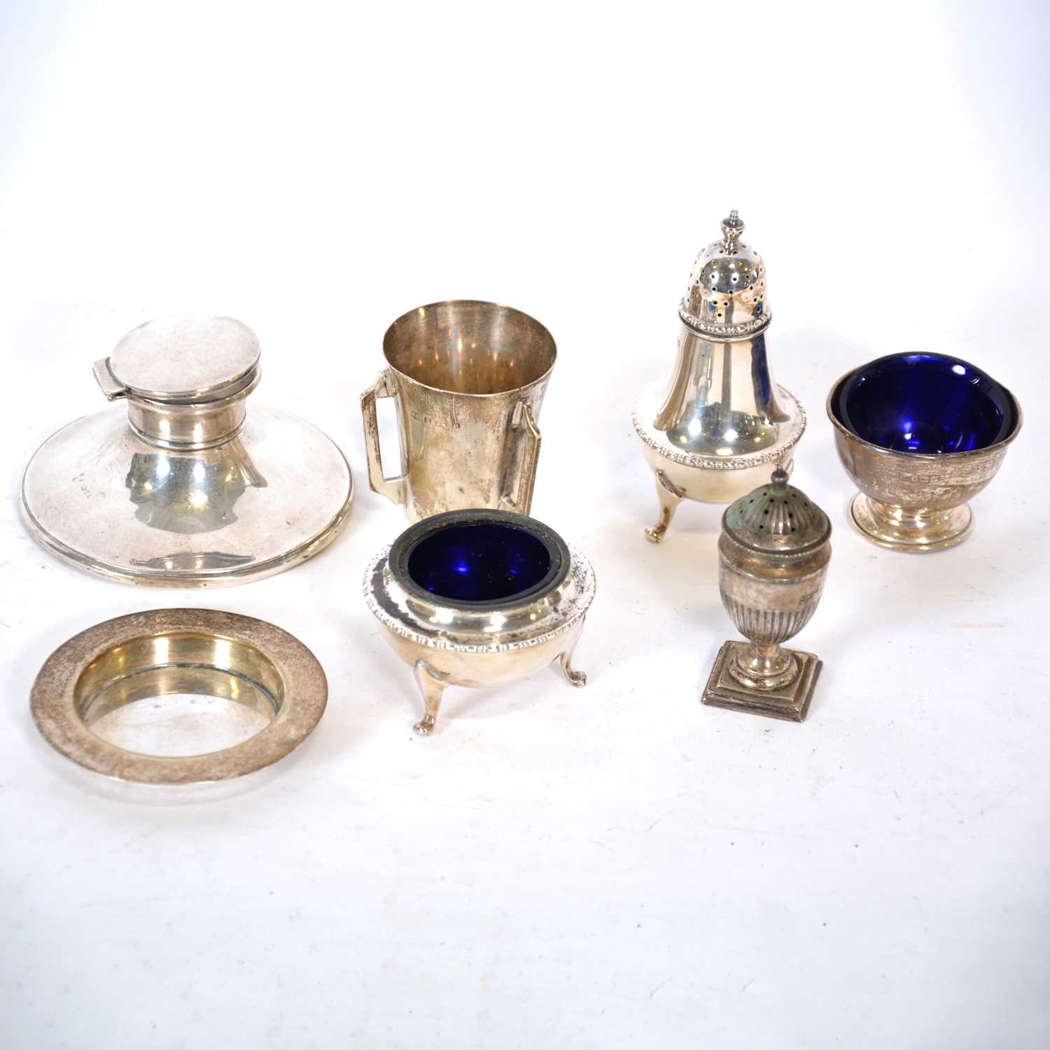 Silver capstan inkwell, Charles Boyton & Son Ltd, London 1925, and other silver wares.