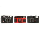 Vintage 1980s and 1990s film cameras, twenty-four including Canon Megazoom 105