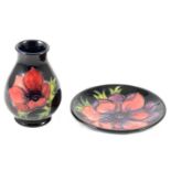 Moorcroft Pottery - an Anemone pattern vase and small dish.
