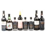 Twelve assorted bottles of port and madeira wine