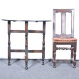 Small joined oak chair, 17th century style; and an oak folding table with an oval top.