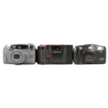 Nine Pentax vintage film cameras including PC35 AF-M; Espio 738S