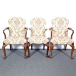 Queen Anne style walnut dining table and chairs,