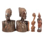 Four carved wooden African figures.
