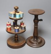 A Victorian turned wood cotton reel stand, 30cm and a 19th century mahogany telescopic candle stand,