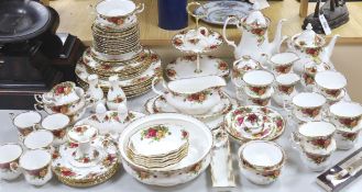 A Royal Albert Old Country Rose tea service, part coffee service and part dinner service