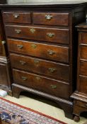 A George III oak chest of two short and four long drawers, on bracket feet, width 102cm, depth 56cm,