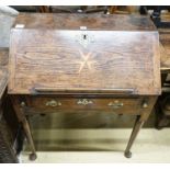 A mid 18th century inlaid oak and elm bureau, with fitted interior and single drawer, width 77cm,