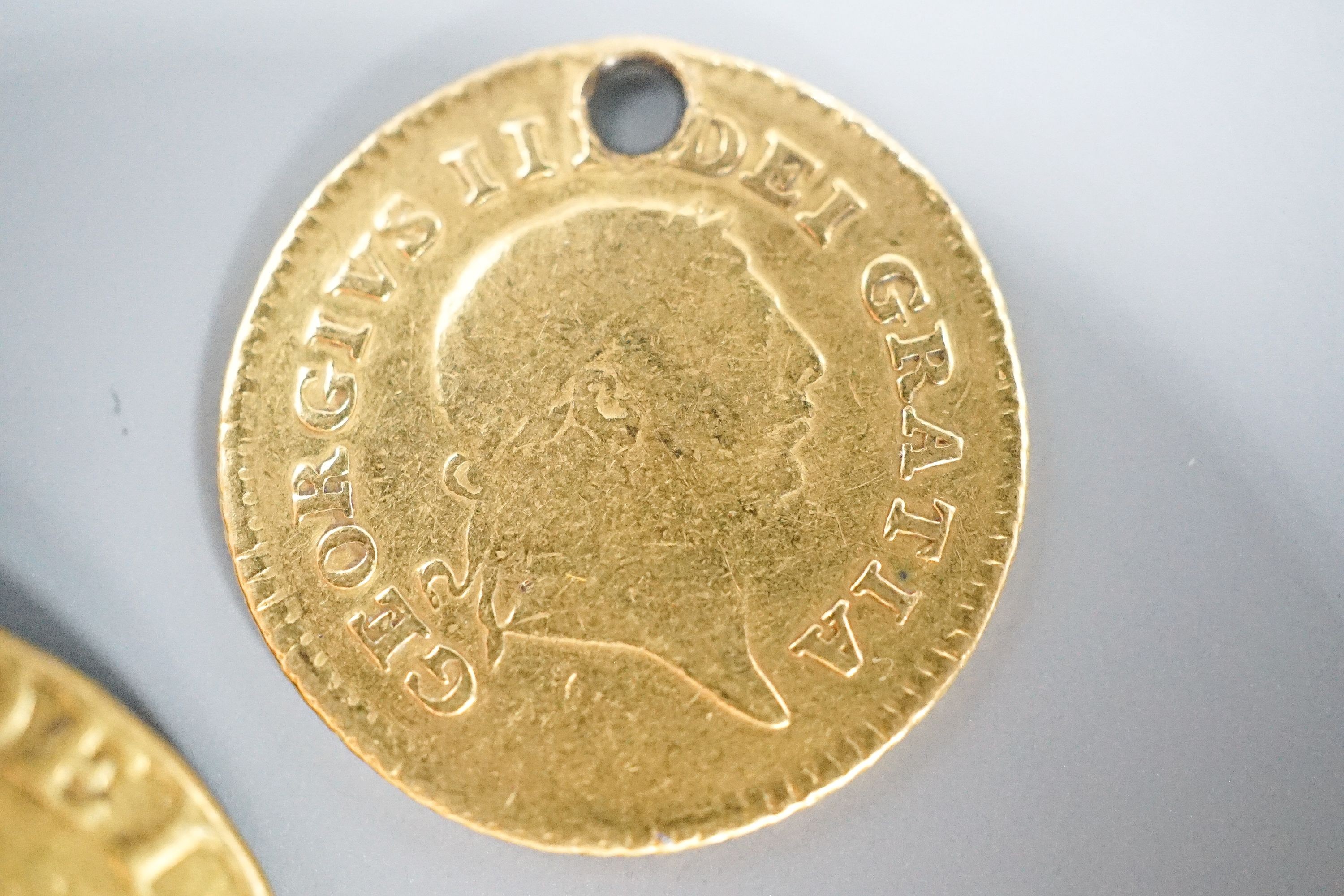 A George III 1788 gold guinea, now with pendant loop and an 1804 gold one third guinea(hole). - Image 3 of 4