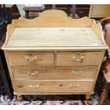 A Victorian pine chest, with three quarter gallery, four drawers and turned feet, width 96cm,