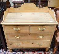 A Victorian pine chest, with three quarter gallery, four drawers and turned feet, width 96cm,